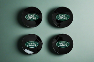 Set of 4 Black and Green Land Rover alloy wheel caps 63mm